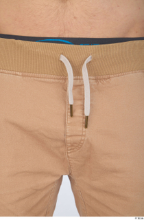 Turgen beige trousers casual dressed hips 0001.jpg